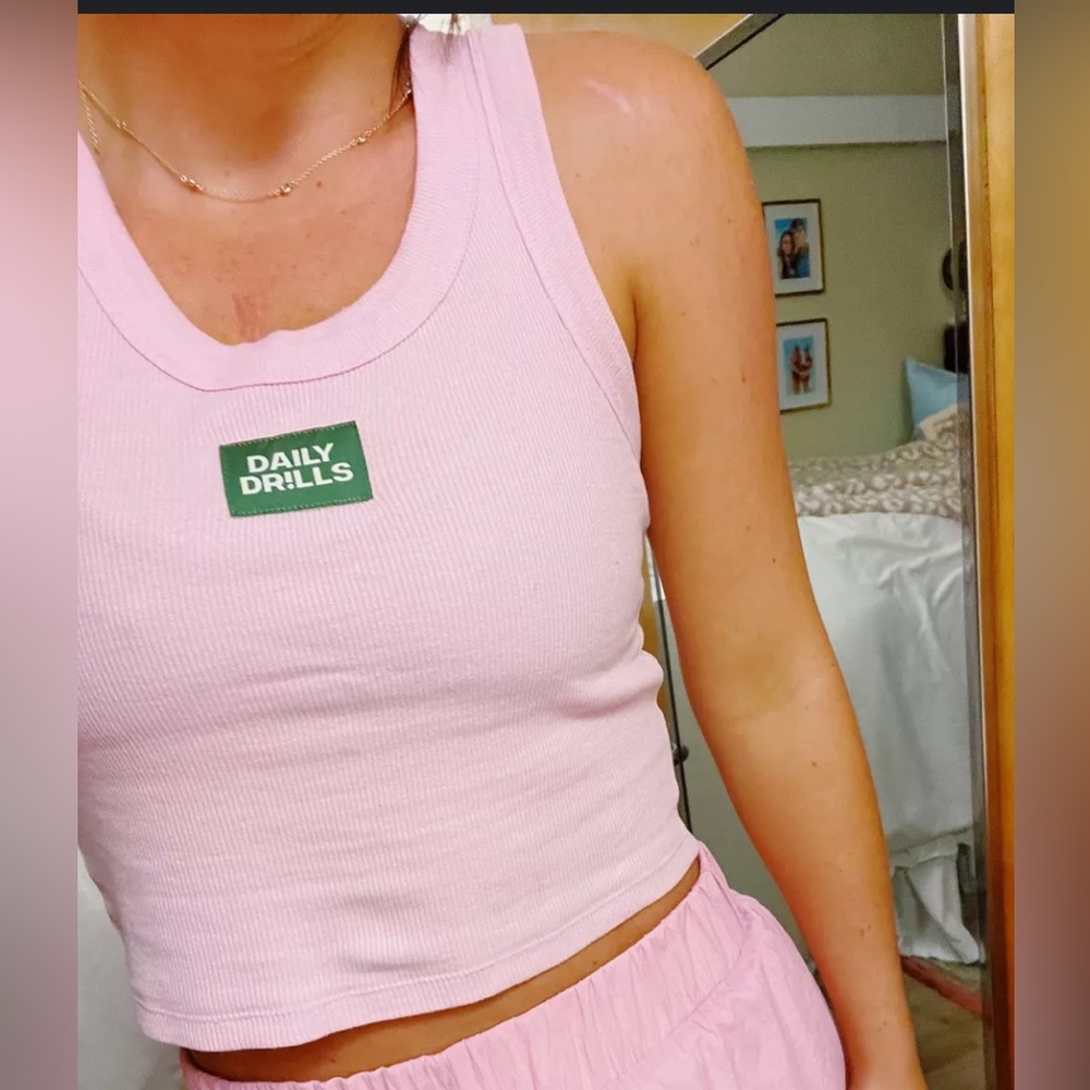 ISO PINK DAILY DRILLS TANK. WILLING TO PAY 150!!!